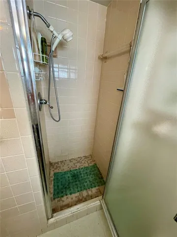 a view of staircase with white walls