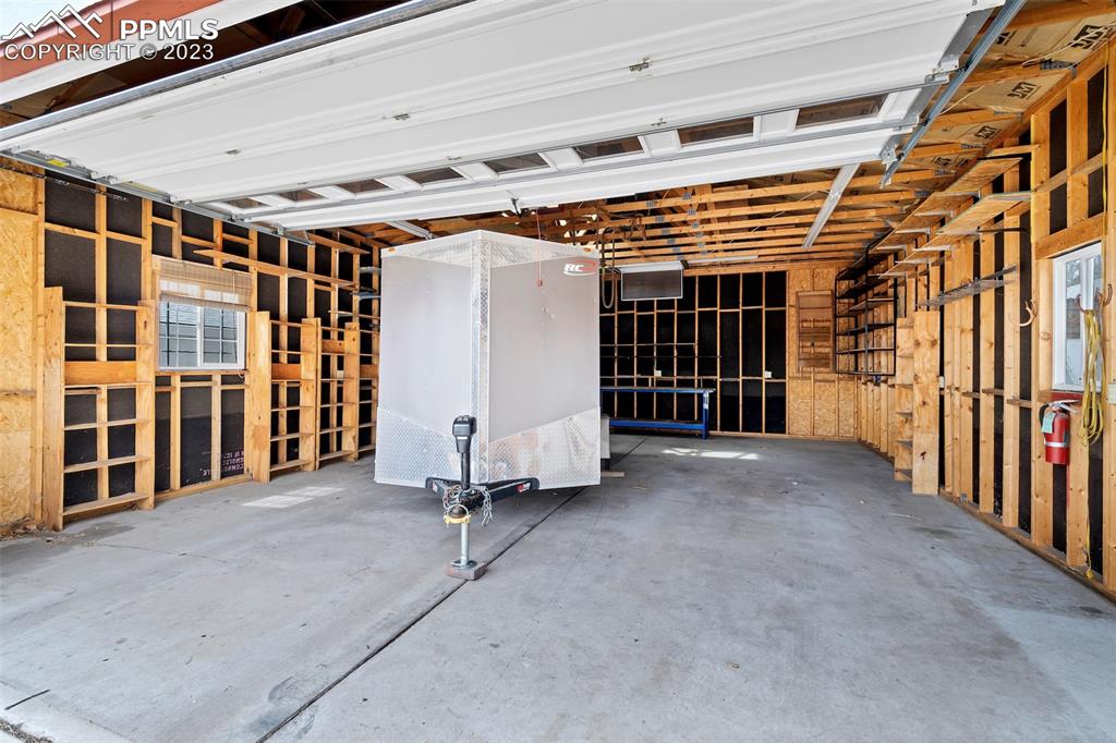 1128 Alexander Road Colorado Springs, CO 80909 - Photo 20 of 26 a view of a room with wooden walls