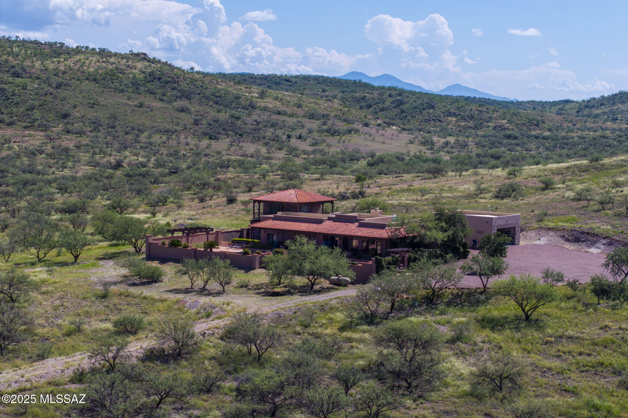 1265 Morning Star Drive Rio Rico, AZ 85648 - Photo 4 of 50 an aerial view of a house with a yard