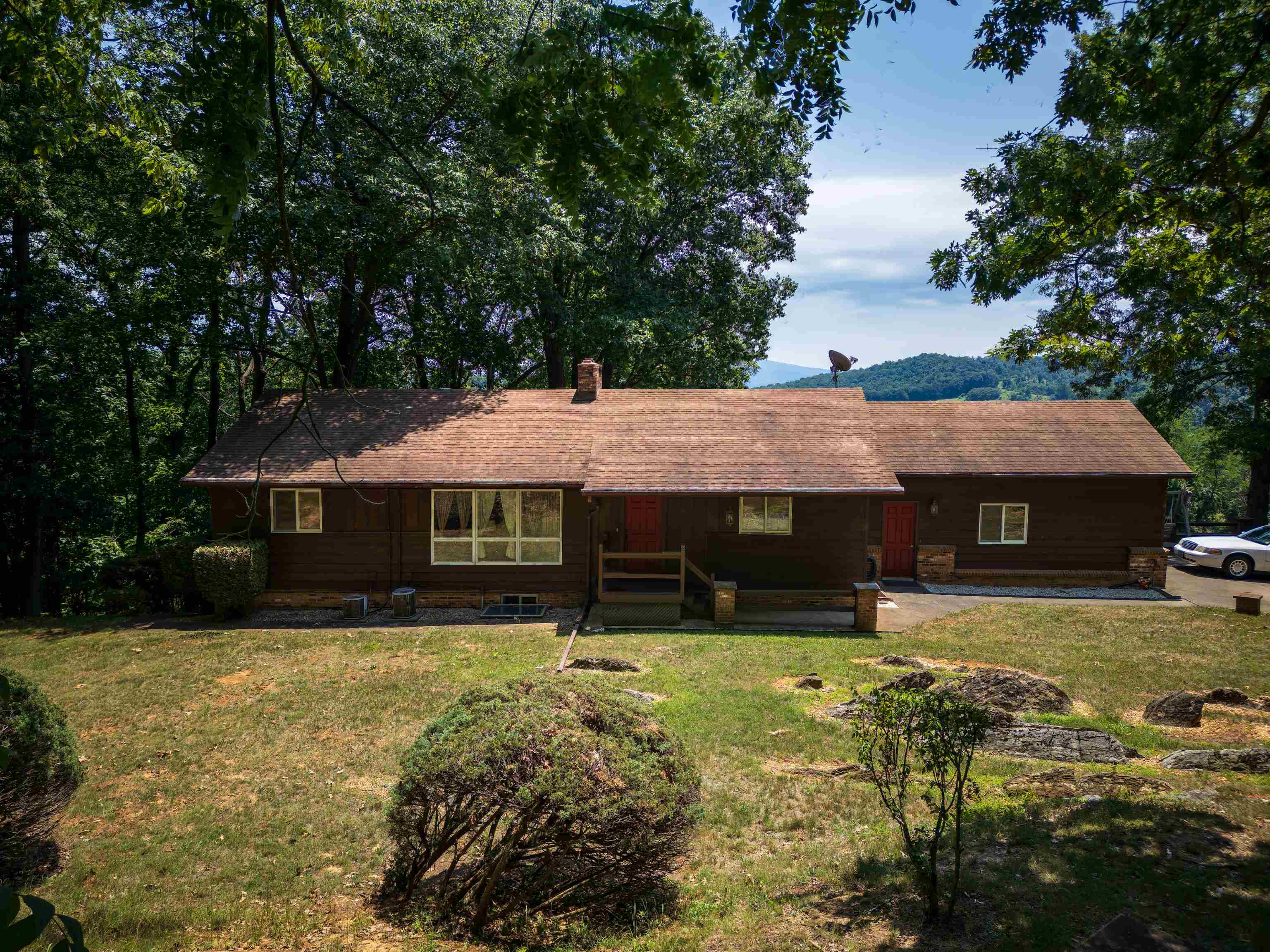 2059 Old Greenville Road Staunton, VA 24401 - Photo 2 of 60 a front view of house with yard and trees