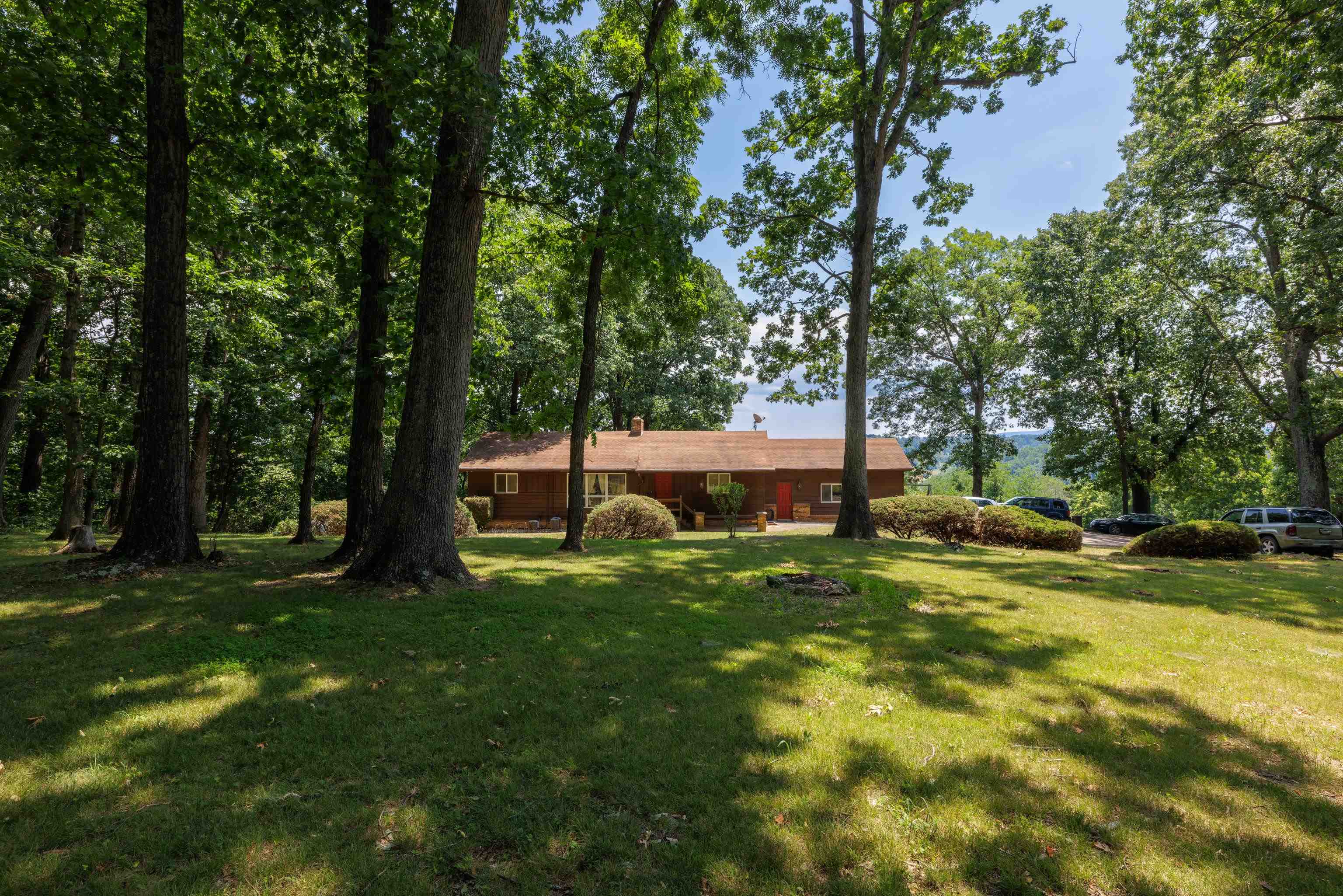 2059 Old Greenville Road Staunton, VA 24401 - Photo 5 of 60 a backyard of a house with table and chairs