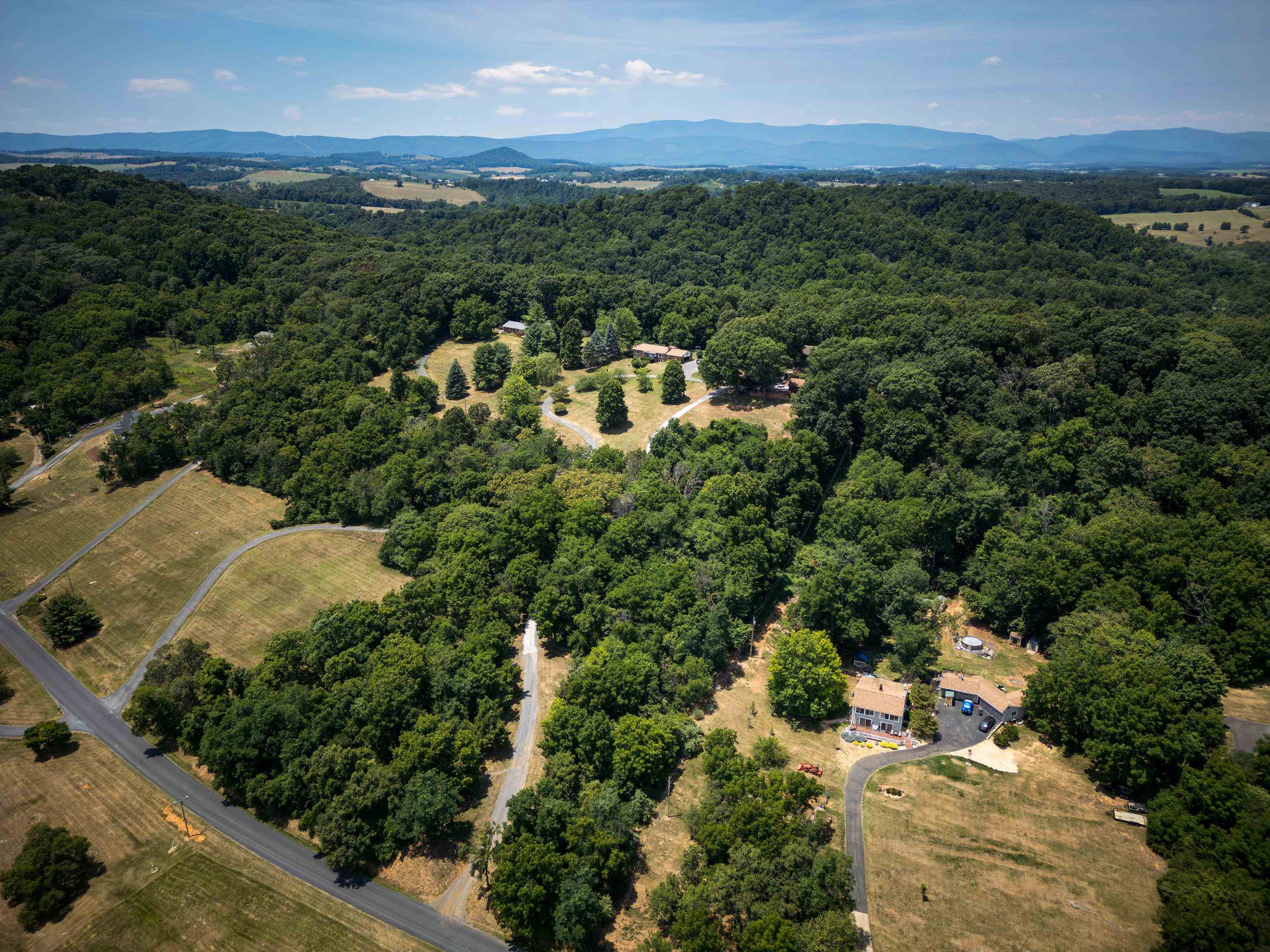 2059 Old Greenville Road Staunton, VA 24401 - Photo 57 of 60 an aerial view of residential houses with outdoor space and trees