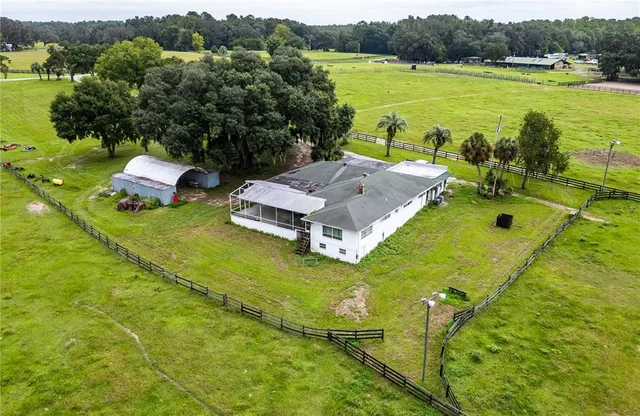 a aerial view of a house with a garden