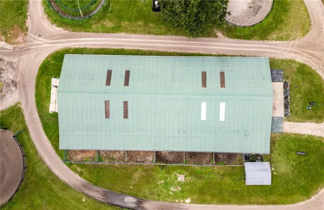 a view of a backyard with a barn