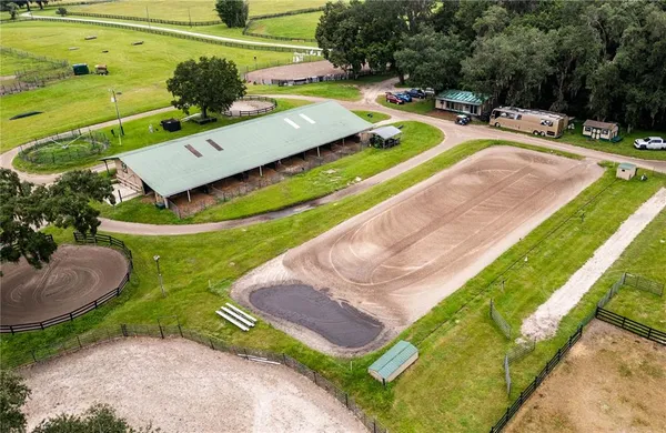 a view of a swimming pool with a yard