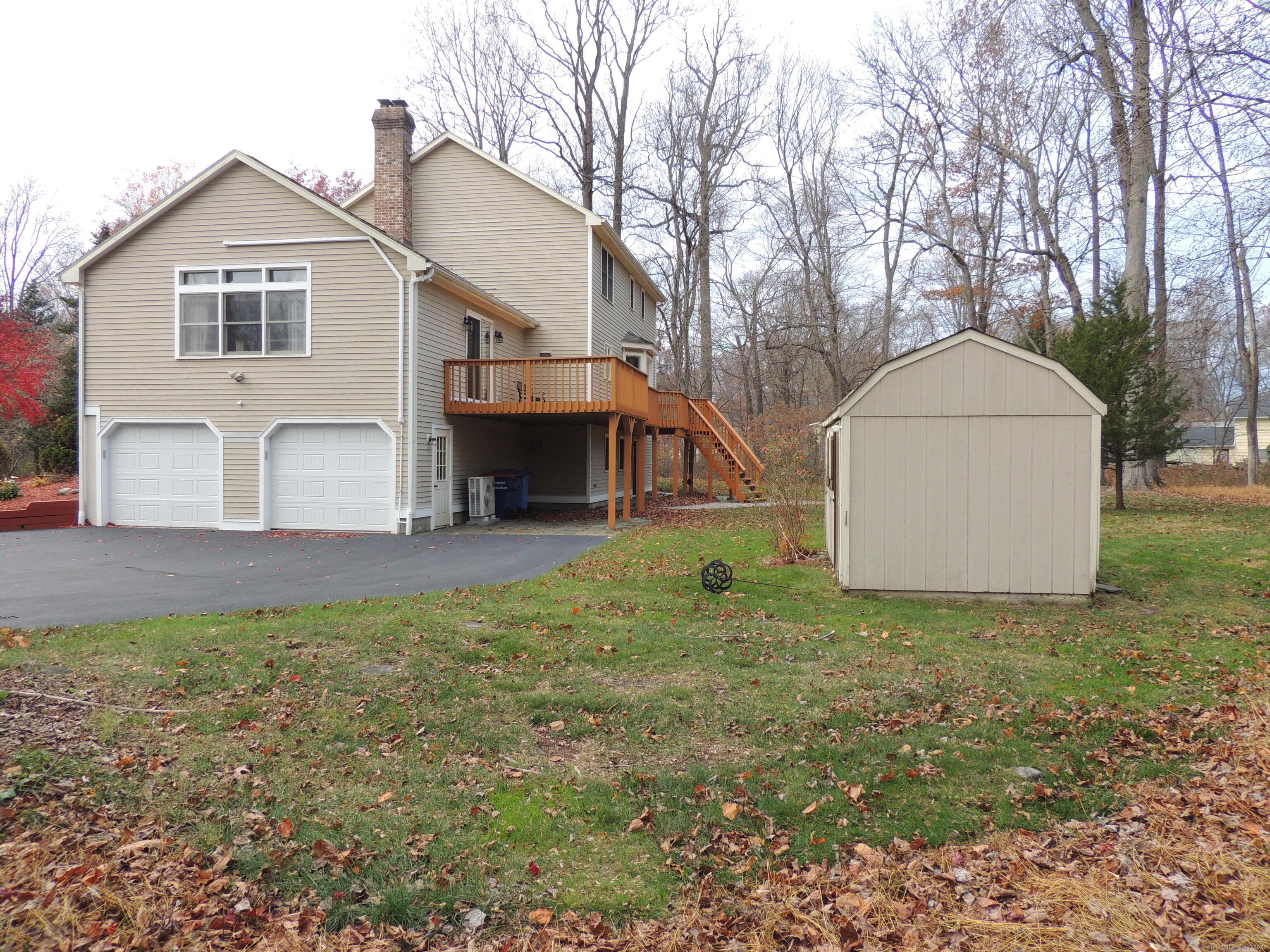 12 Cardinal Lane Monroe, CT 06468 - Photo 32 of 38 a view of a house with a yard
