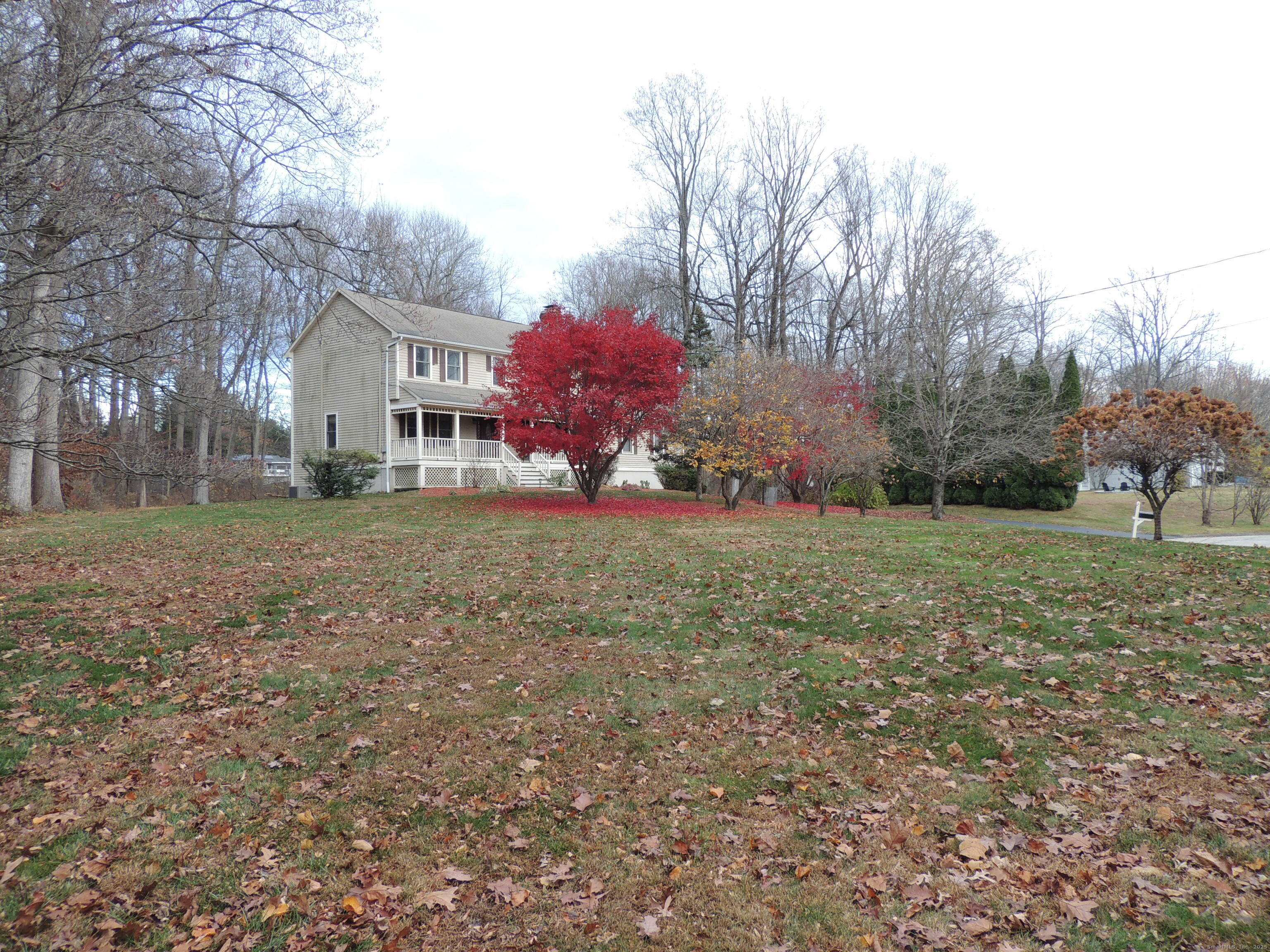 12 Cardinal Lane Monroe, CT 06468 - Photo 33 of 38 a view of a house with a yard