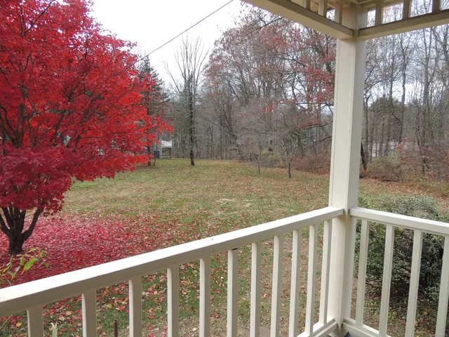 a view of a wooden fence