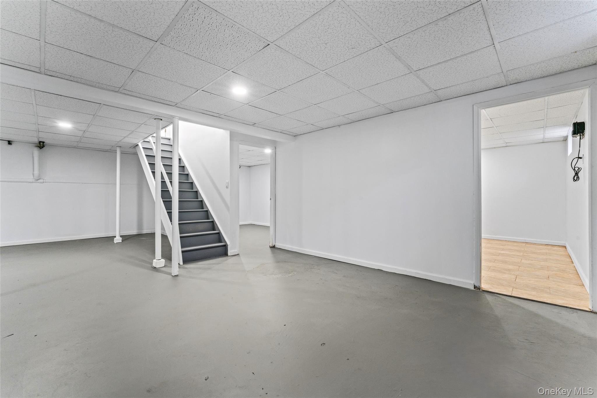 126 Bagatelle Road Melville, NY 11747 - Photo 36 of 50 an empty room with windows