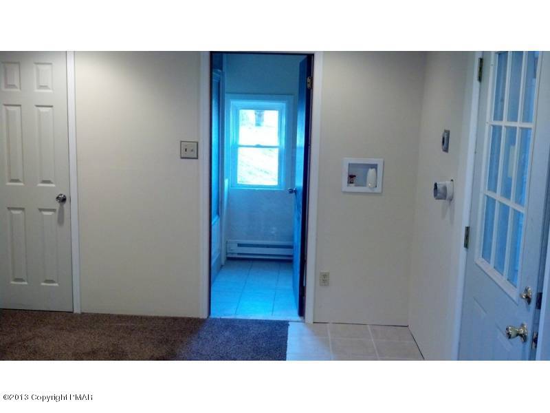 3 D Weir Road Gilbert, PA 18331 - Photo 8 of 11 a black and white photo of a room