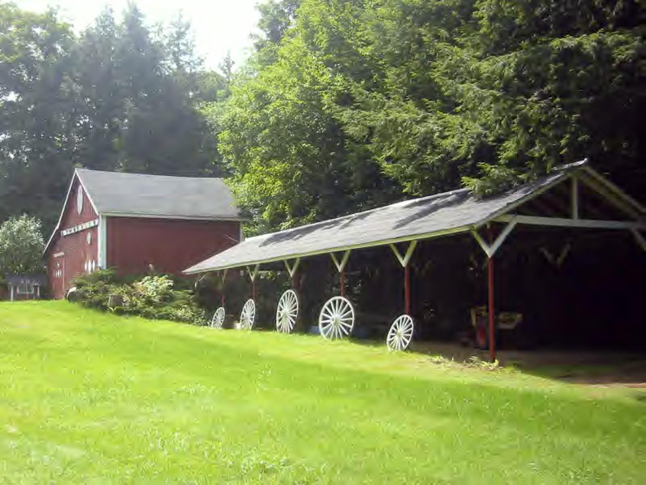 669 Sandmill Road Cheshire, MA 01225 - Photo 3 of 6 a front view of a house with garden