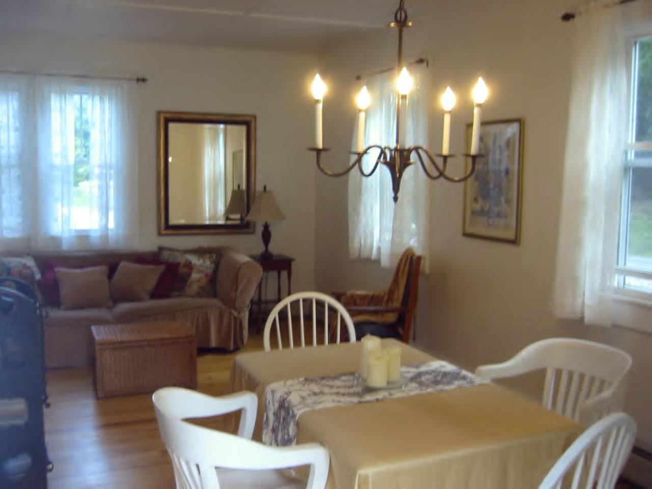 669 Sandmill Road Cheshire, MA 01225 - Photo 6 of 6 a view of a dining room with furniture and wooden floor