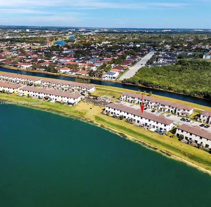 10162 Southwest 228th Terrace Miami, FL 33190 - Photo 1 of 20 an aerial view of a city