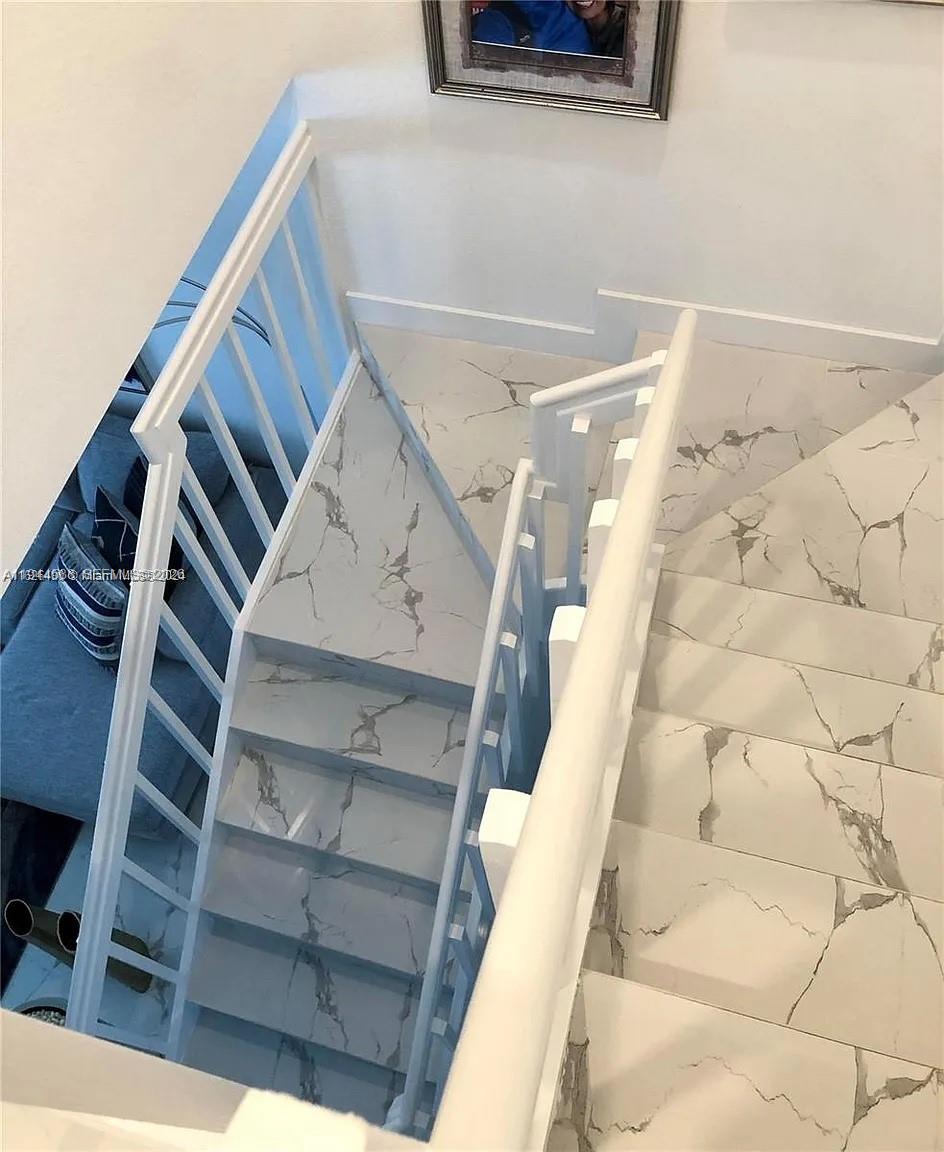 10162 Southwest 228th Terrace Miami, FL 33190 - Photo 14 of 20 a view of entryway with wooden floor