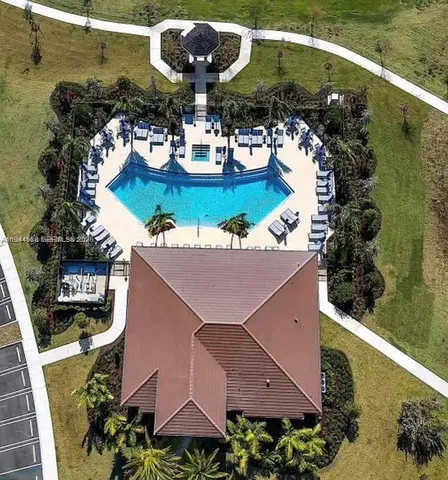 a view of a balcony with two chairs and a table