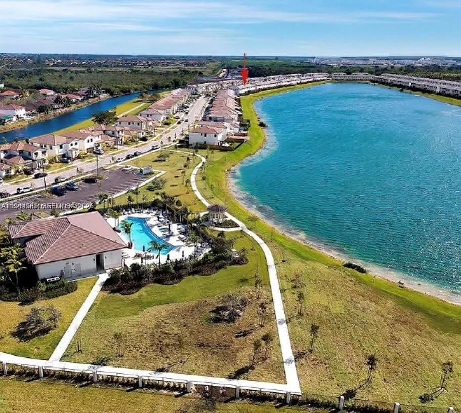 10162 Southwest 228th Terrace Miami, FL 33190 - Photo 2 of 20 a view of a swimming pool with an ocean view
