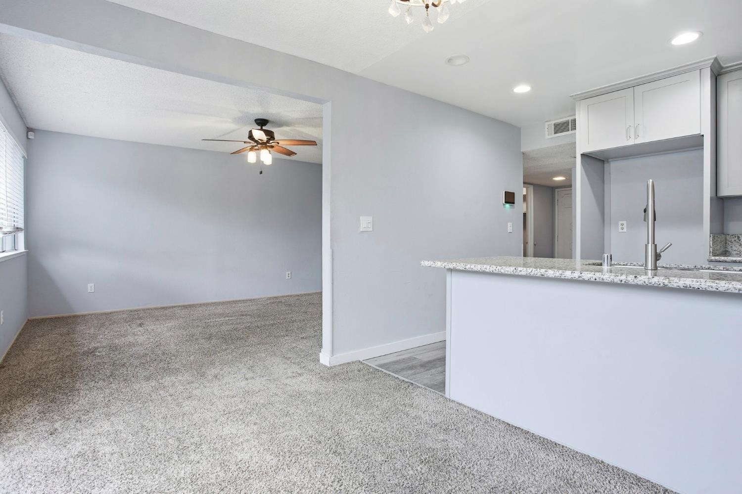 5805 Muldrow Road Sacramento, CA 95841 - Photo 13 of 28 a view of a kitchen with a sink and cabinet