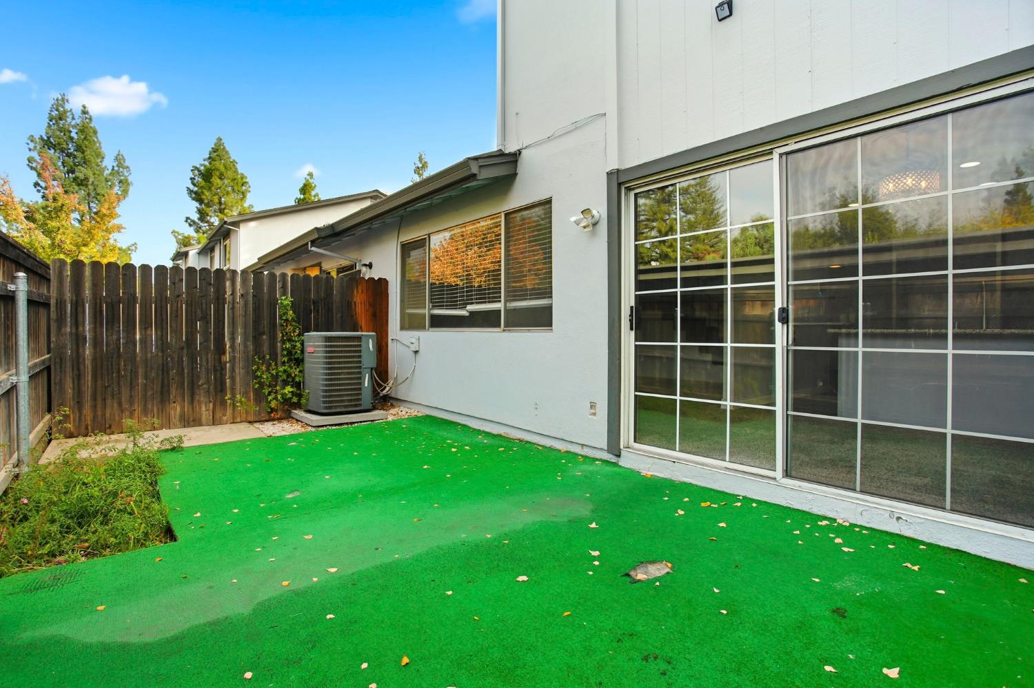 5805 Muldrow Road Sacramento, CA 95841 - Photo 26 of 28 a view of an house with backyard and a garden