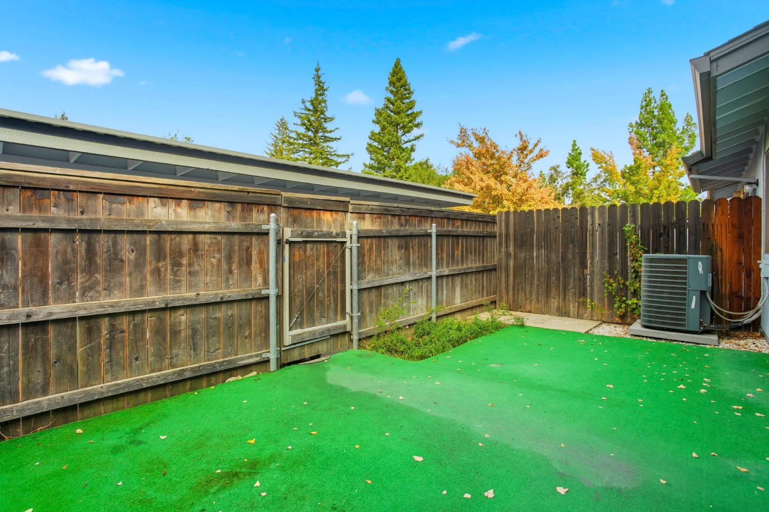 5805 Muldrow Road Sacramento, CA 95841 - Photo 27 of 28 a view of an house with backyard and wooden fence