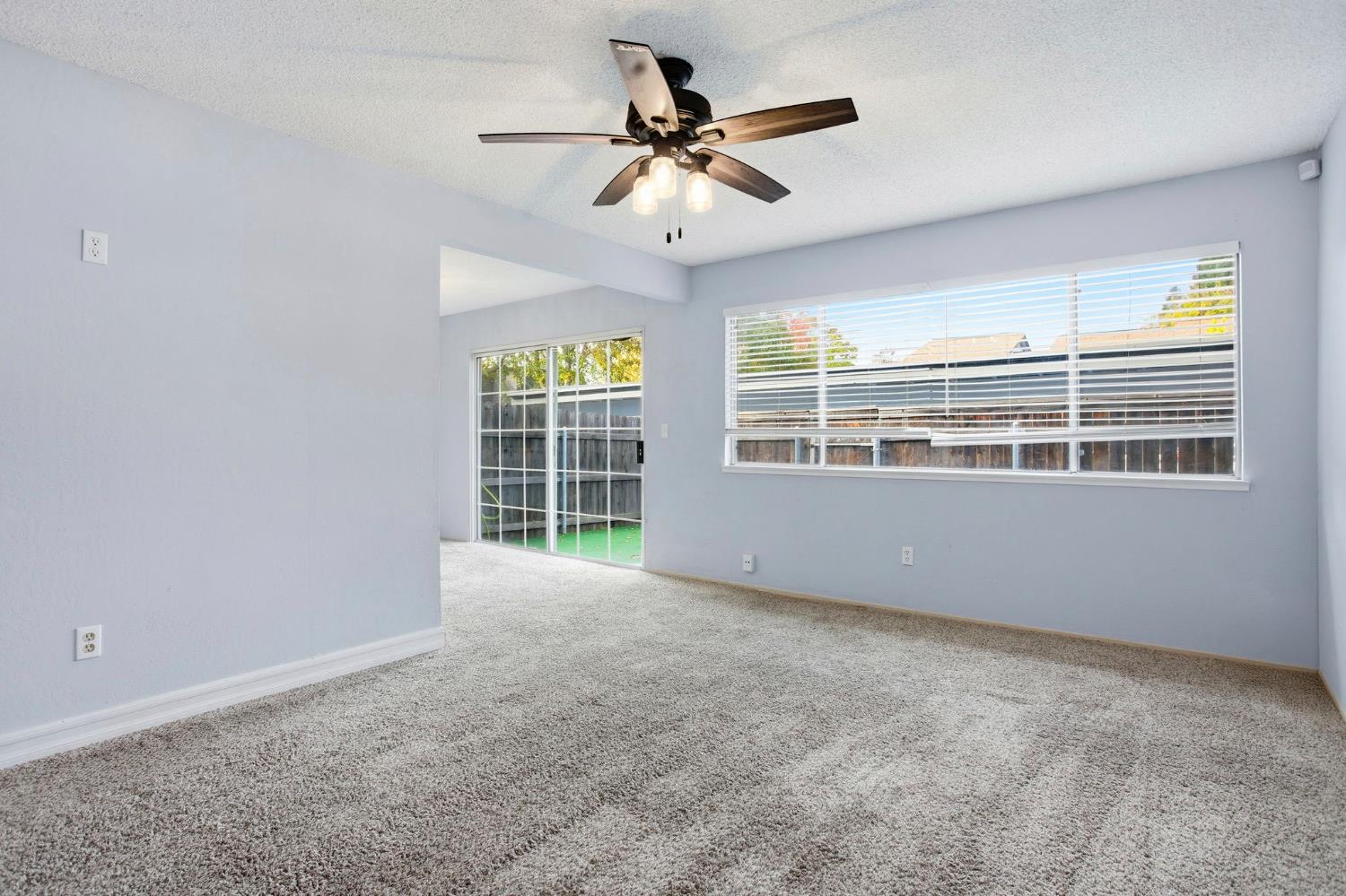 5805 Muldrow Road Sacramento, CA 95841 - Photo 8 of 28 a view of an empty room with a window