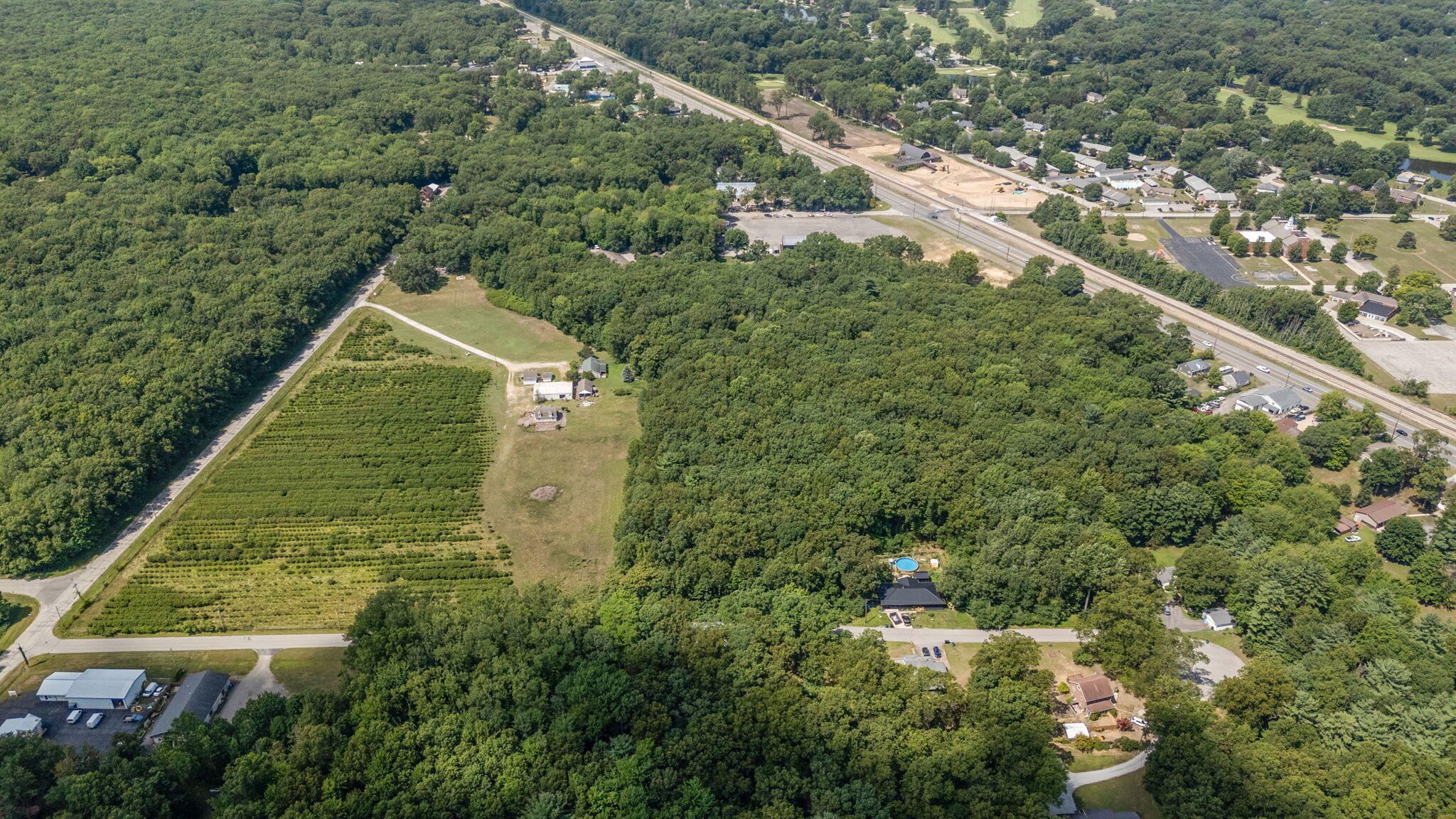 650 Freyer Road Michigan City, IN 46360 - Photo 4 of 49 an aerial view of a house with a yard and lake view