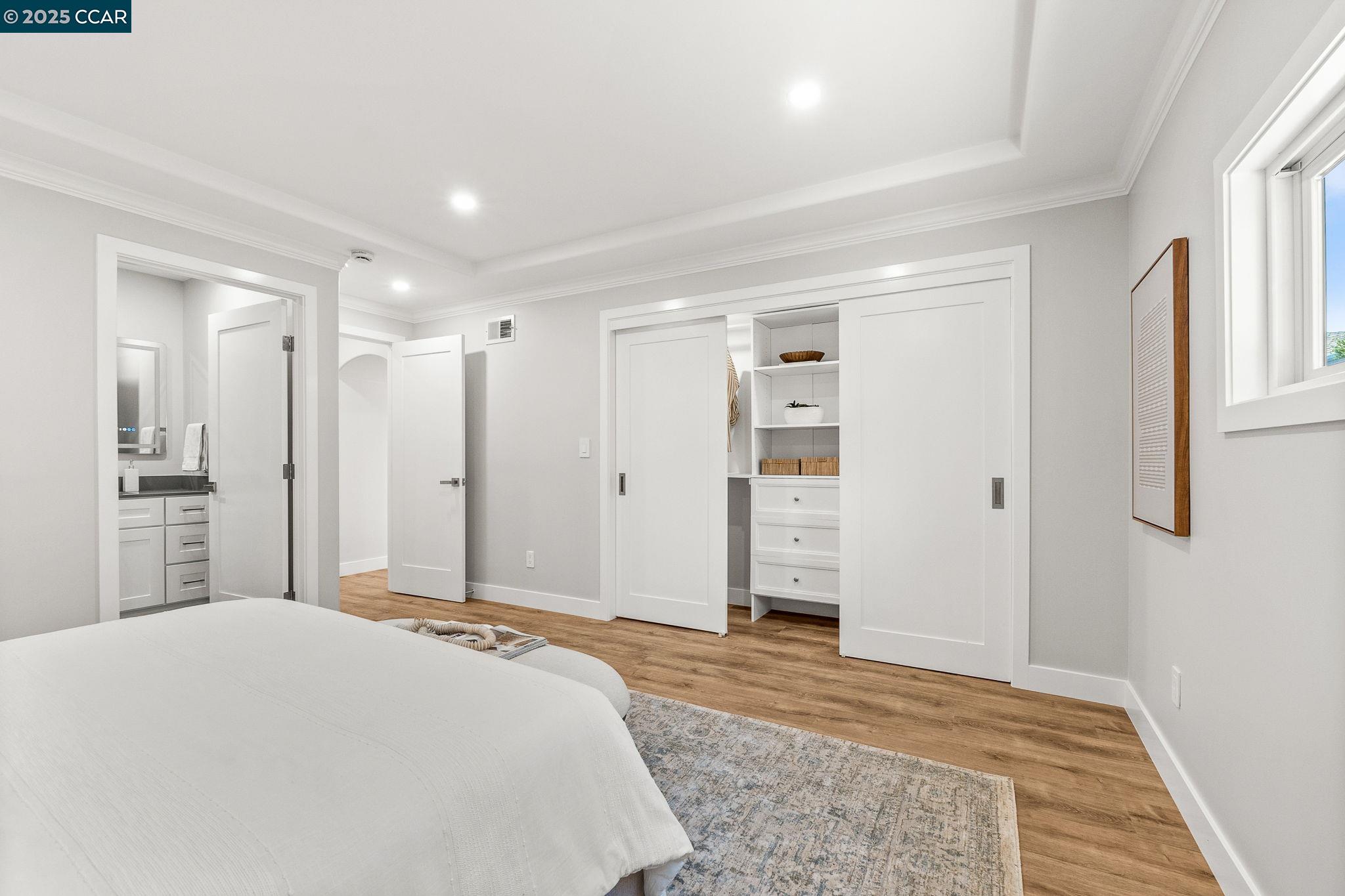 2300 Pine Knoll Drive, Unit 1 Walnut Creek, CA 94595 - Photo 13 of 46 a spacious bedroom with a bed and closet