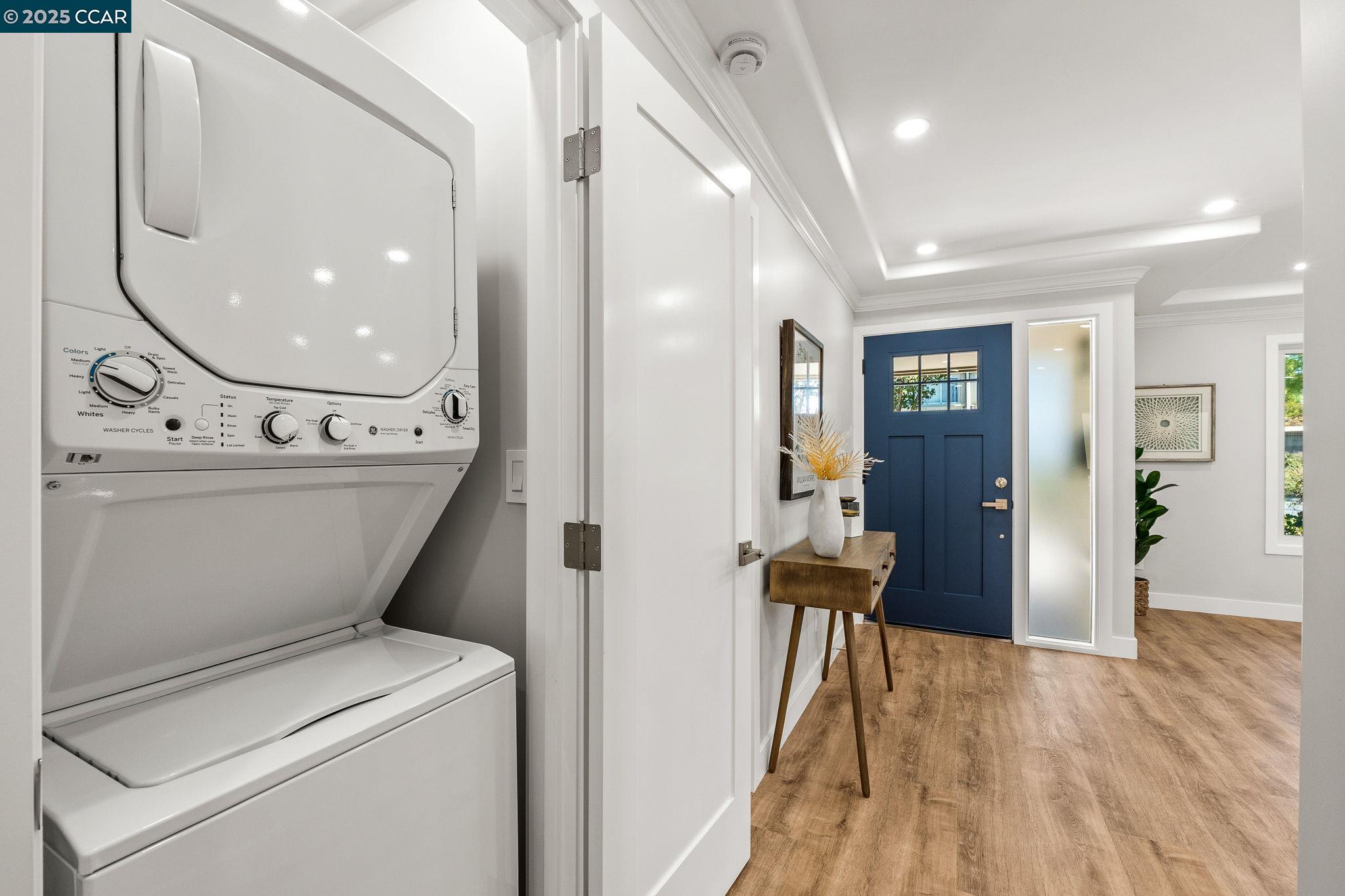 2300 Pine Knoll Drive, Unit 1 Walnut Creek, CA 94595 - Photo 16 of 46 a view of a hallway with wooden floor and staircase