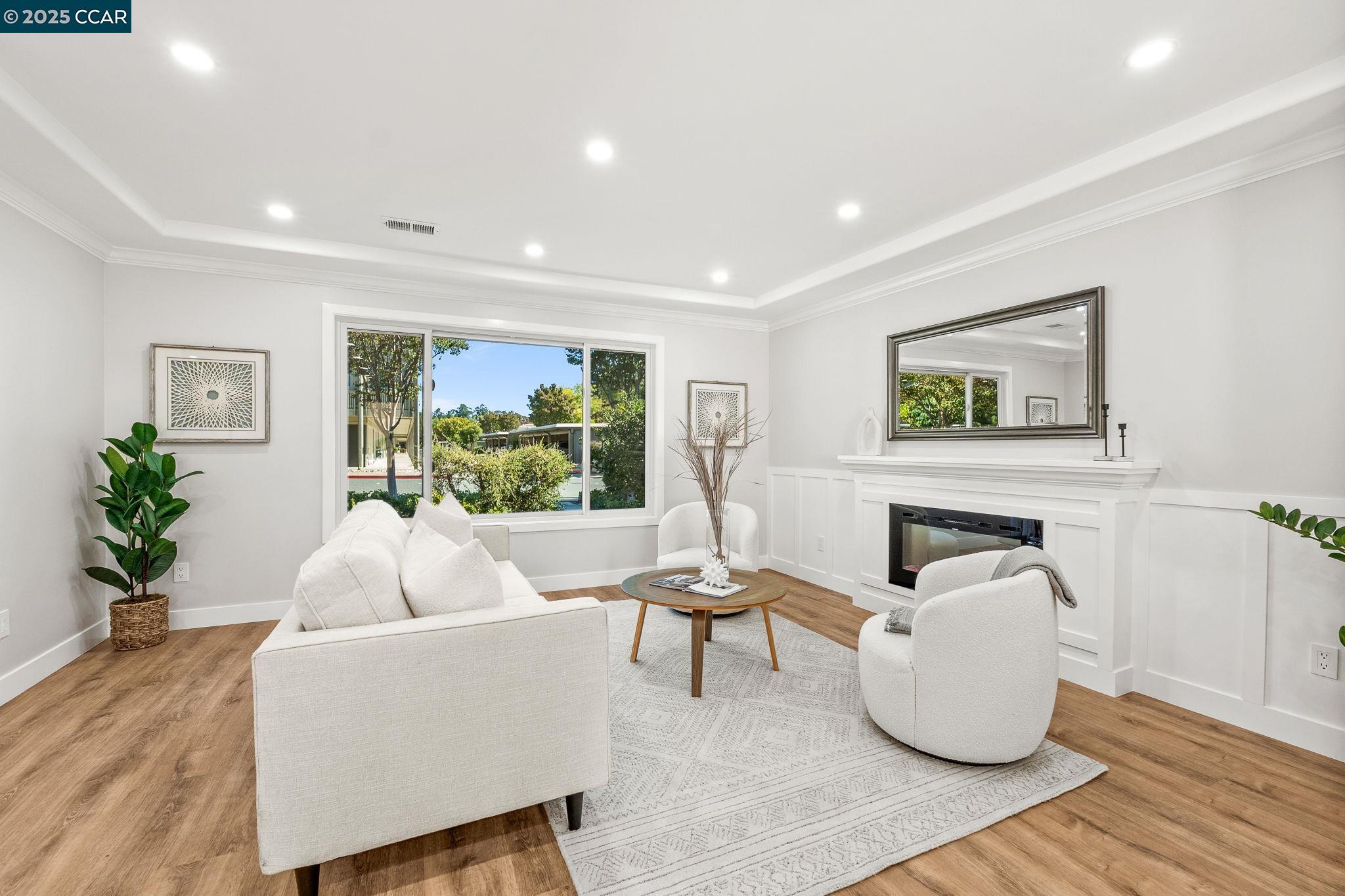 2300 Pine Knoll Drive, Unit 1 Walnut Creek, CA 94595 - Photo 20 of 46 a living room with furniture and a large window