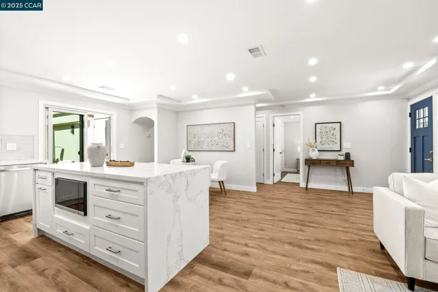 a spacious bathroom with a double vanity sink and a mirror
