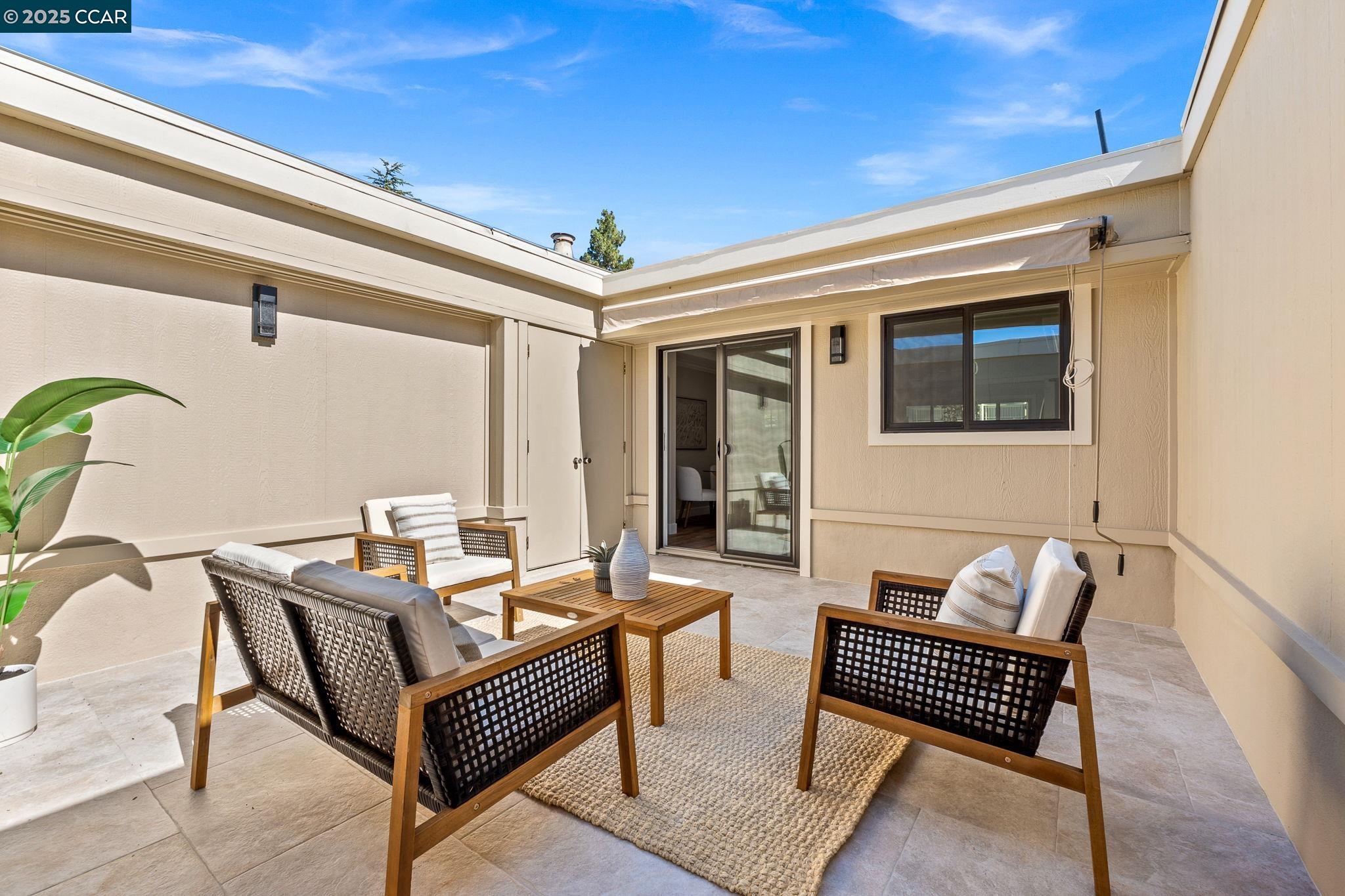 2300 Pine Knoll Drive, Unit 1 Walnut Creek, CA 94595 - Photo 24 of 46 a outdoor living space with furniture