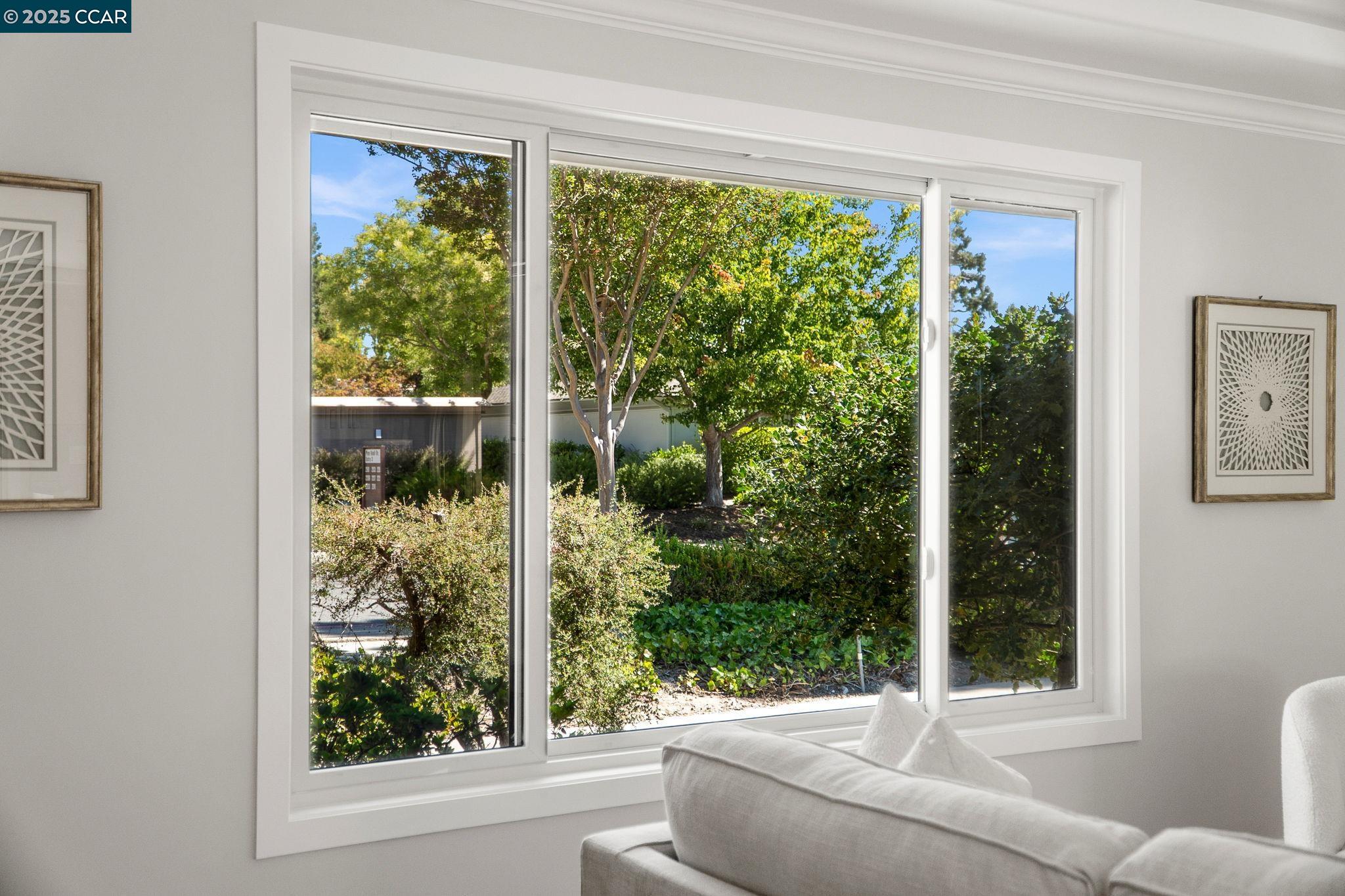 2300 Pine Knoll Drive, Unit 1 Walnut Creek, CA 94595 - Photo 32 of 46 a living room with couch and a window