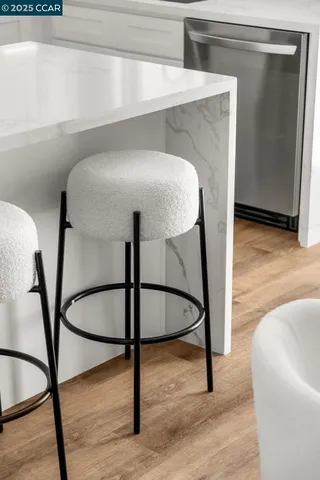 a view of staircase with a rug and a window