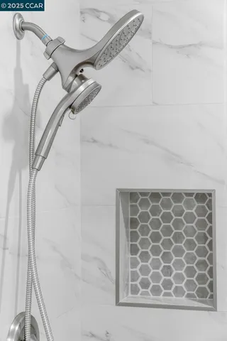 a kitchen with a sink and potted plant