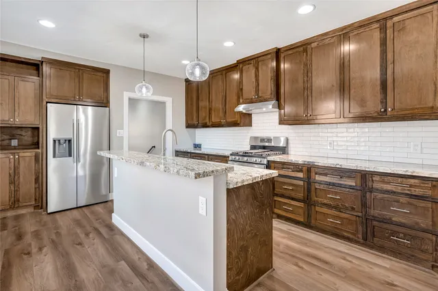 a bathroom with a shower and a mirror