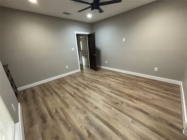 a view of an empty walk in closet