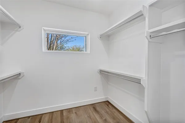 a view of an empty walk in closet