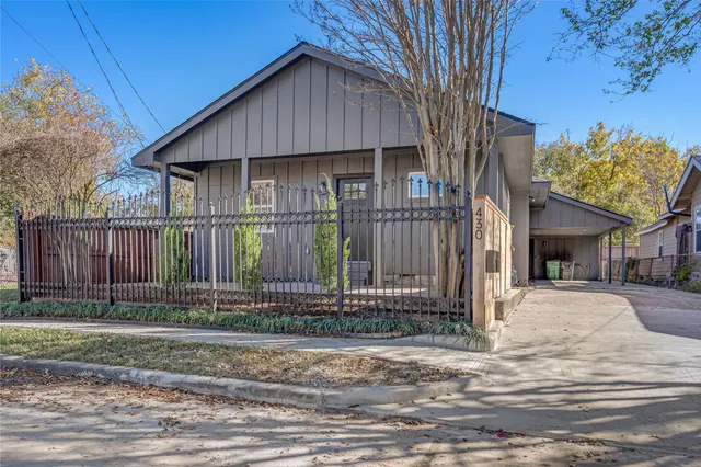 a view of a house with a garage