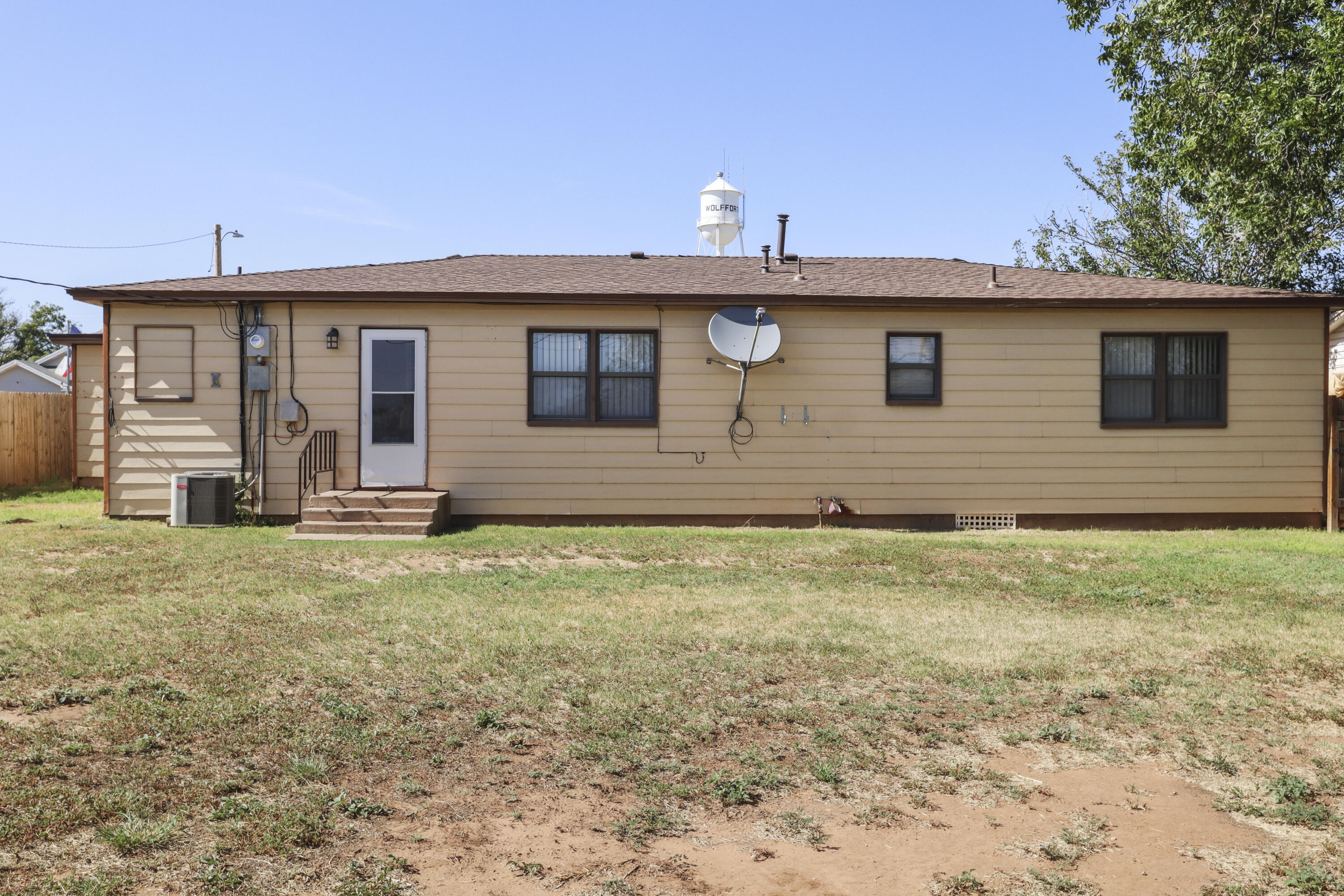 511 6th Street Wolfforth, TX 79382 - Photo 25 of 26 a view of a house with a backyard