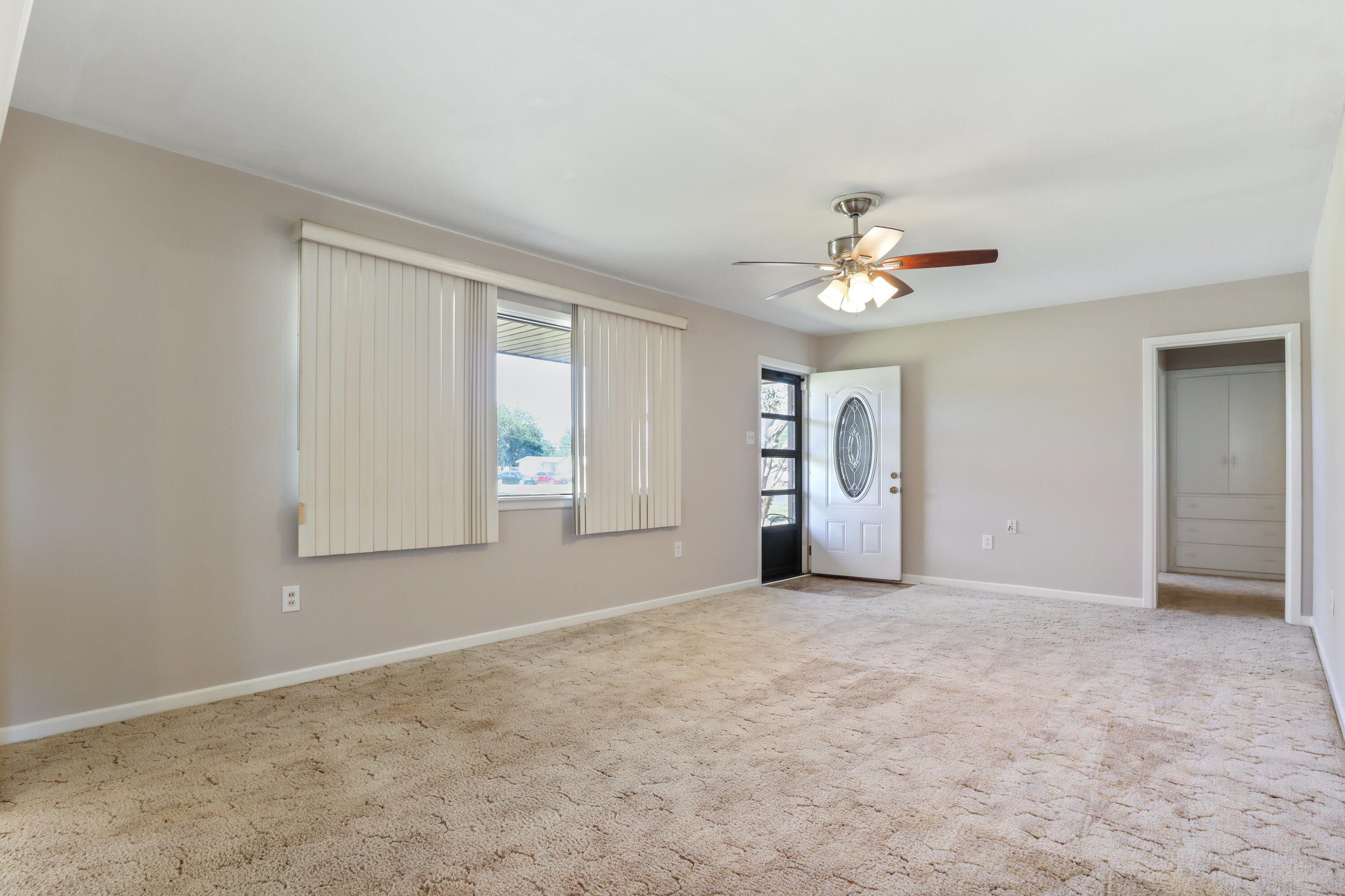 511 6th Street Wolfforth, TX 79382 - Photo 9 of 26 a view of an empty room with a window