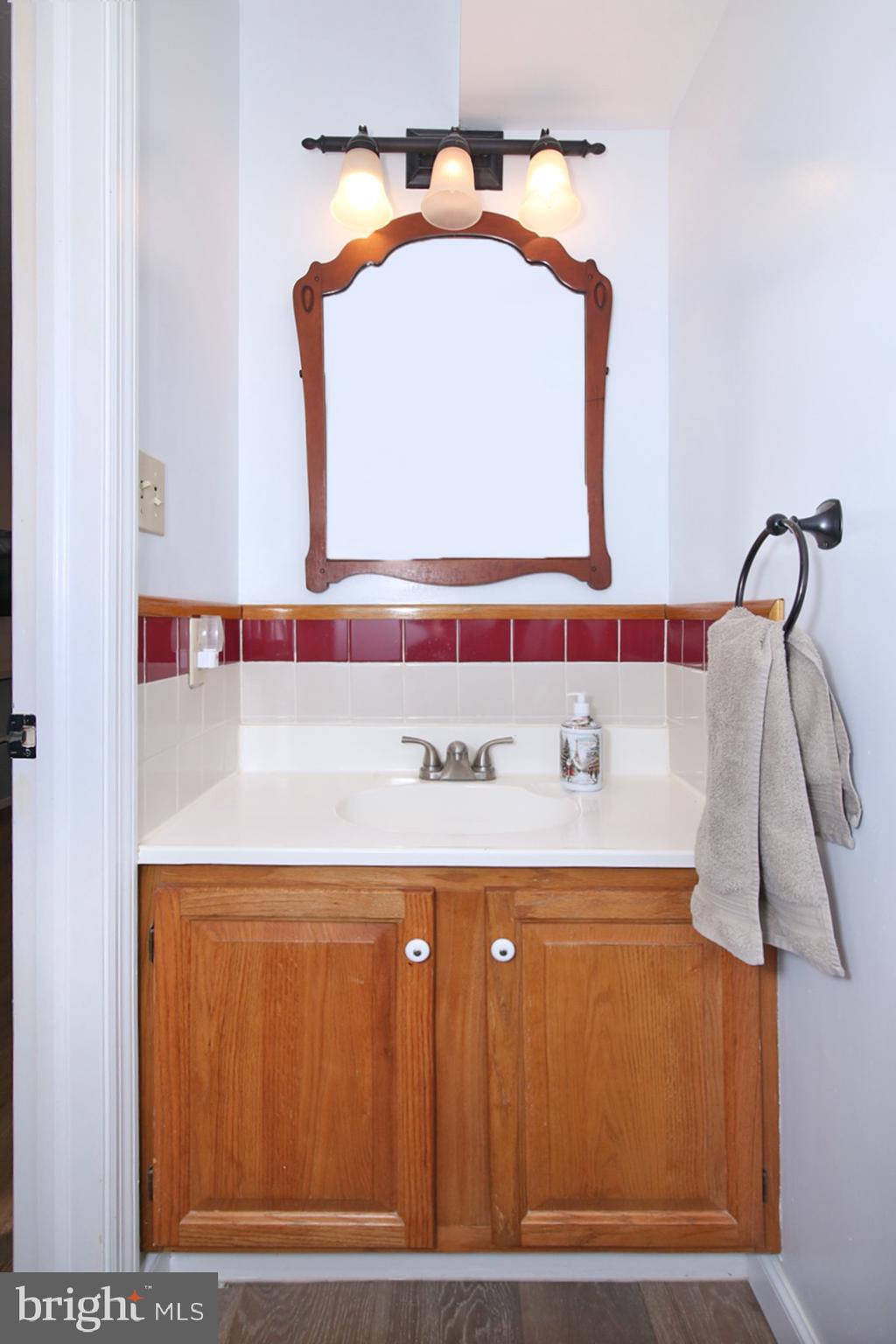 77 East Mohler Church Road Ephrata, PA 17522 - Photo 12 of 35 a bathroom with a sink and a mirror