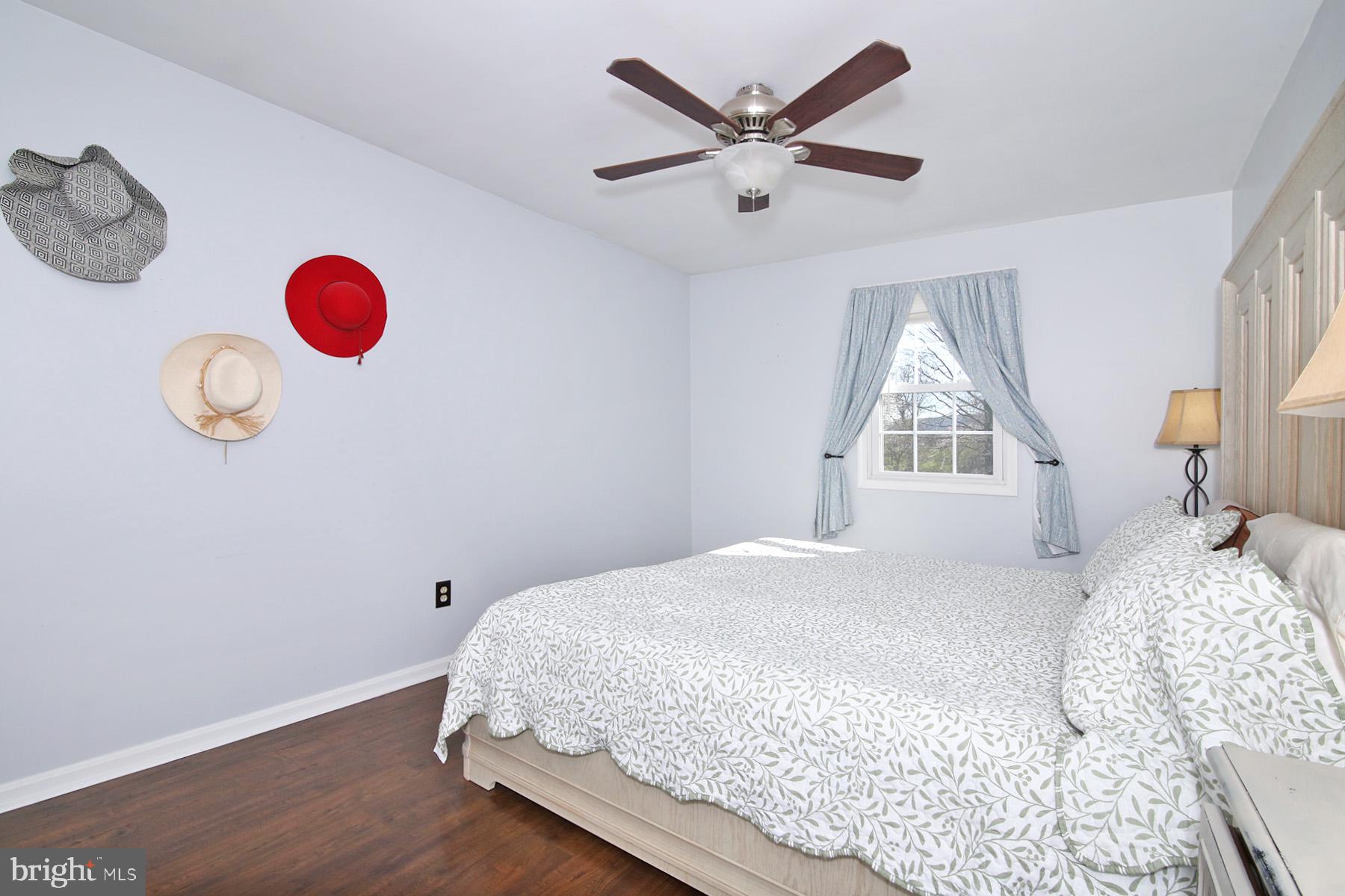 77 East Mohler Church Road Ephrata, PA 17522 - Photo 20 of 35 a bedroom with a bed and a chandelier