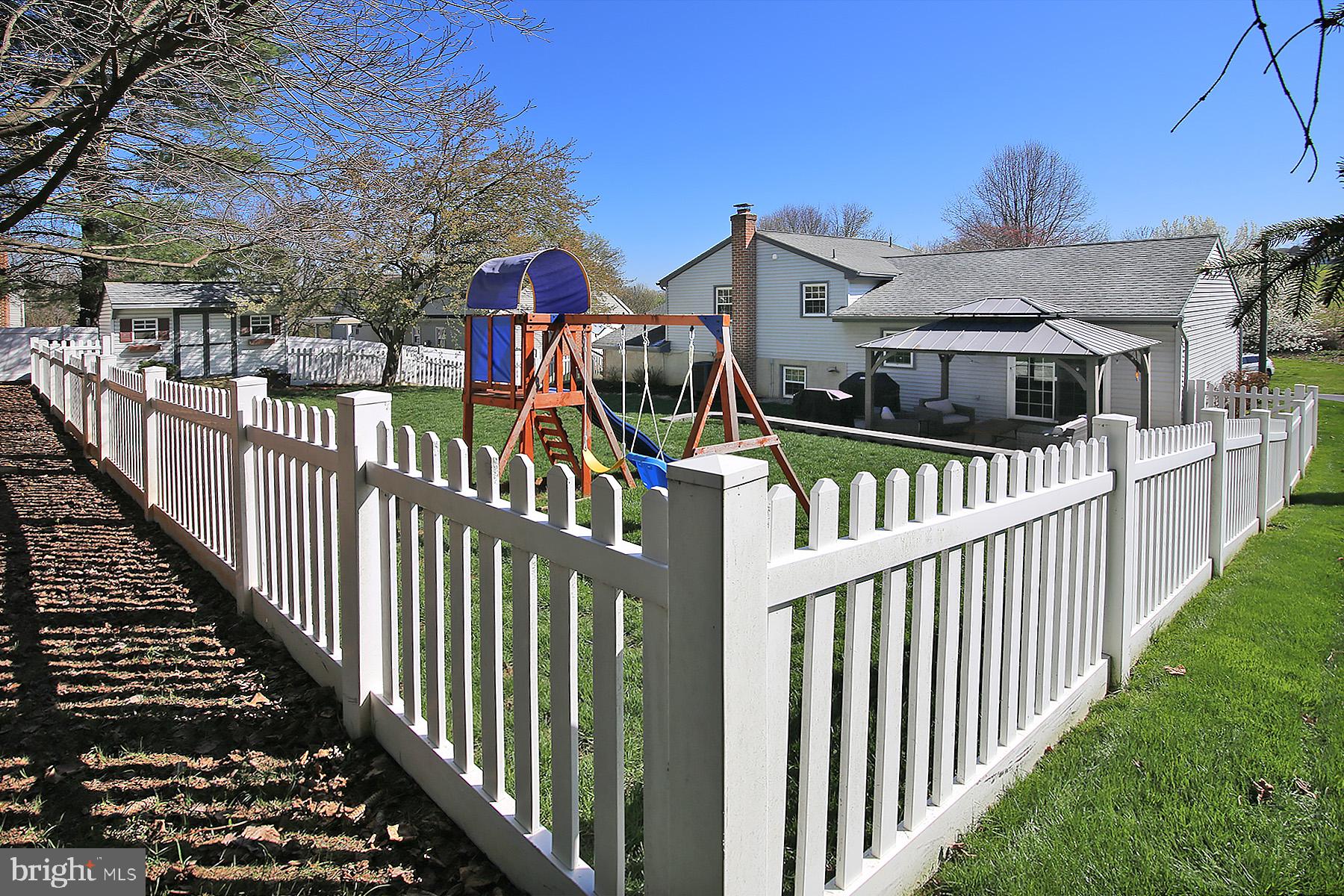77 East Mohler Church Road Ephrata, PA 17522 - Photo 31 of 35 a view of a house with wooden fence