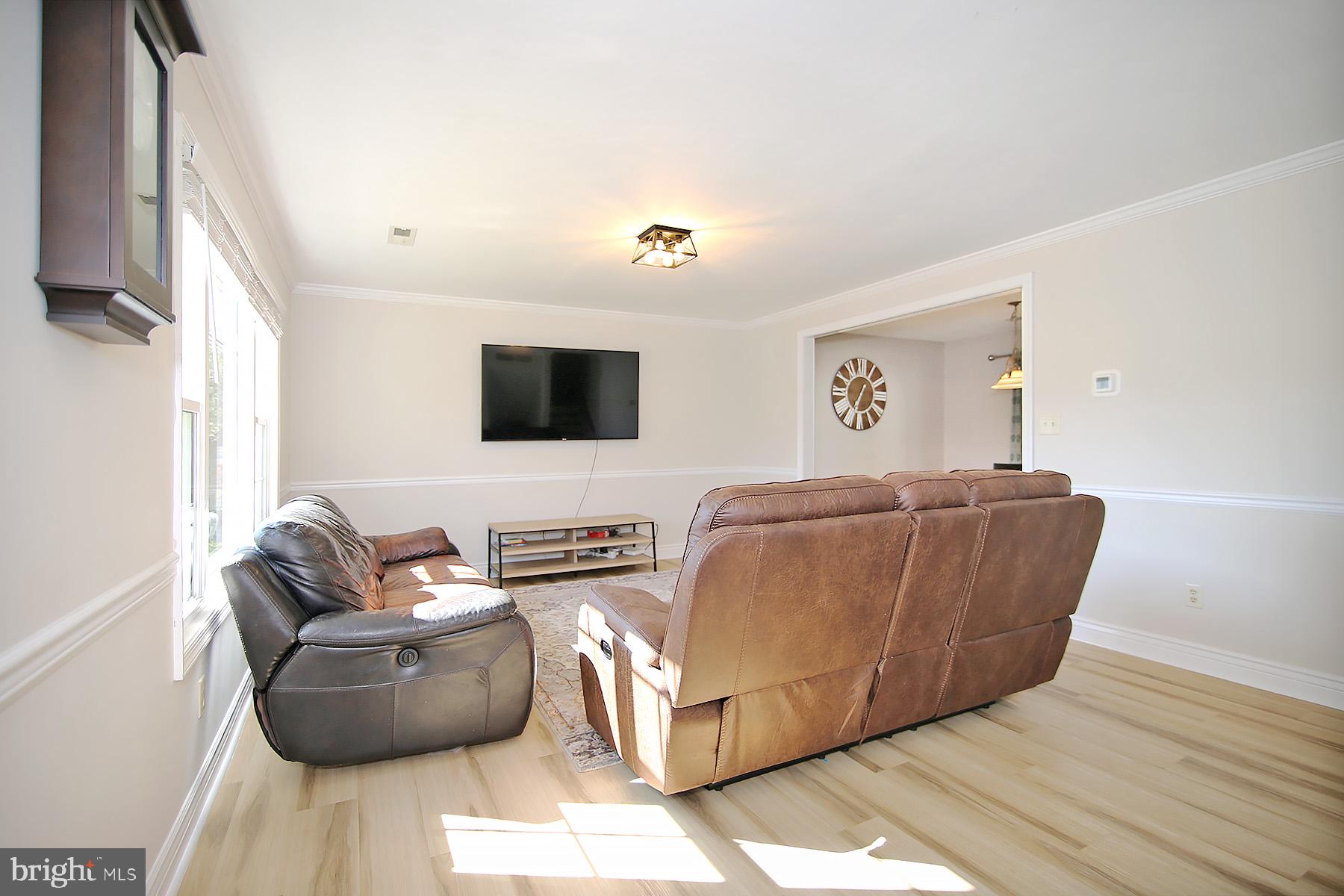 77 East Mohler Church Road Ephrata, PA 17522 - Photo 5 of 35 a living room with furniture and a flat screen tv