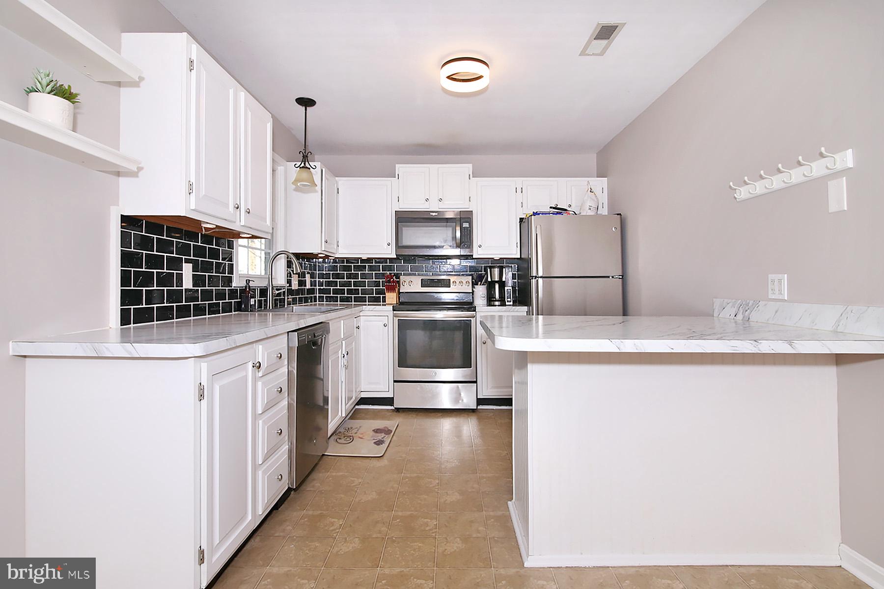 77 East Mohler Church Road Ephrata, PA 17522 - Photo 7 of 35 Modern kitchen with sleek finishes.