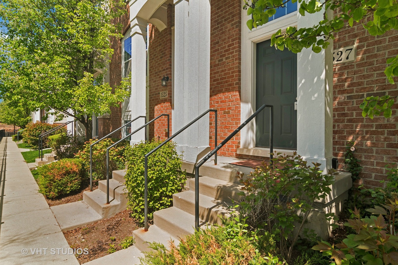 a view of a house with a tree