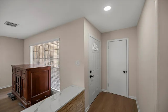 a view of livingroom with furniture and wooden floor