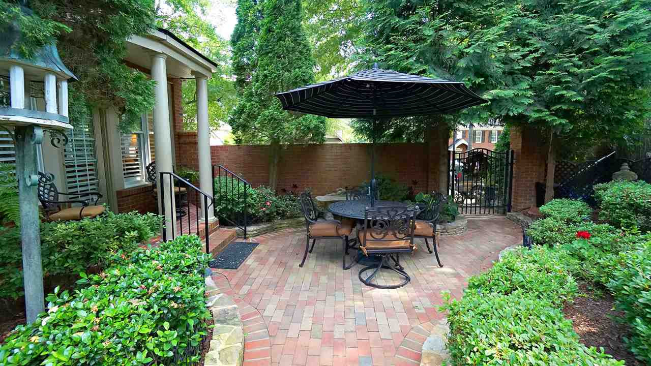 1900 Torrington Street Raleigh, NC 27615 - Photo 25 of 30 Irrigation and drip system throughout yard. Perfect blend of stone and brick work to distinguish each area of the yard while maintaining a perfect cohesiveness Patio