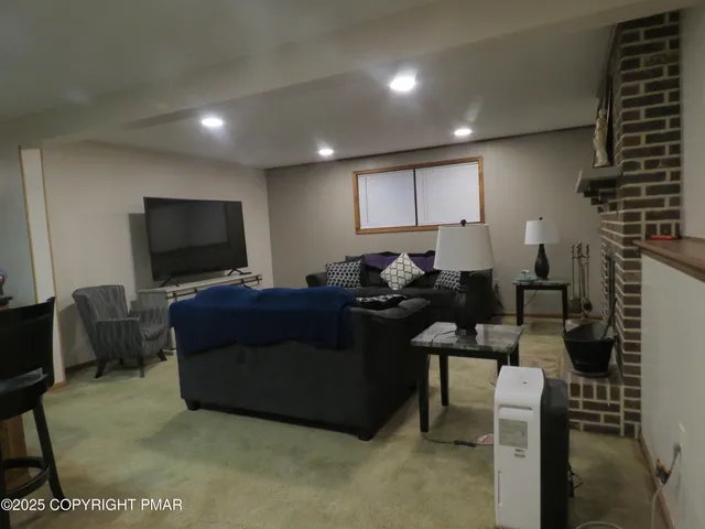 a kitchen with a table and chairs in it