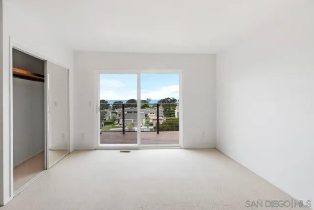 an aerial view of a city with lots of residential buildings