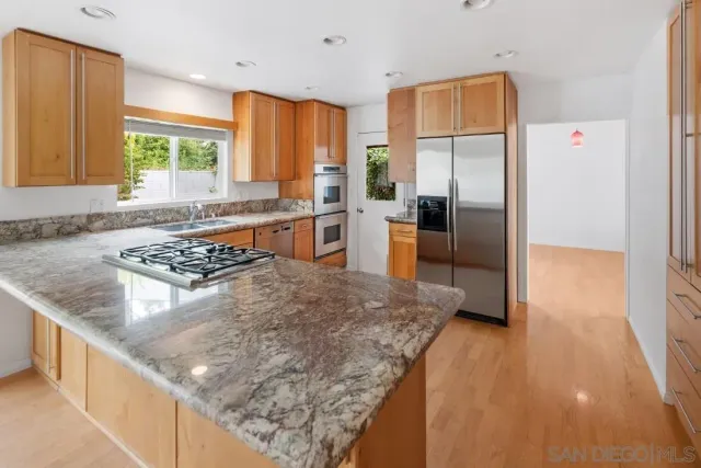 a view of empty room with floor to ceiling window